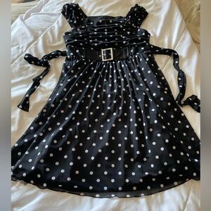Black Polka Dot Dress with faux Buckle & attached belt ties in back. Girls 10
